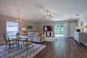 a living room with a table and a couch at Hawkins Cove in Sandalwood