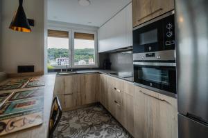 Kuchyň nebo kuchyňský kout v ubytování Alfonso X - Apartamentos Burgos Deluxe