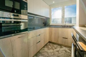 Kuchyň nebo kuchyňský kout v ubytování Alfonso X - Apartamentos Burgos Deluxe