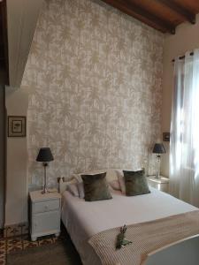 Ένα ή περισσότερα κρεβάτια σε δωμάτιο στο Jardines de Hortensia - Vacation home Tenerife