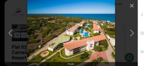 an aerial view of a resort with the ocean in the background at Praia dos Carneiros Flat 206 C in Tamandaré