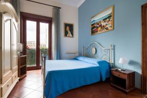A bed or beds in a room at B&B Casa Degli Artisti