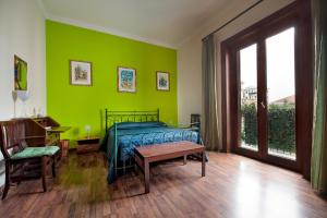 A bed or beds in a room at B&B Casa Degli Artisti