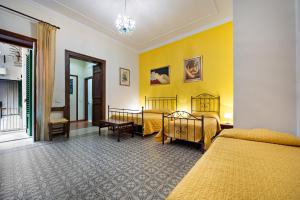 A bed or beds in a room at B&B Casa Degli Artisti