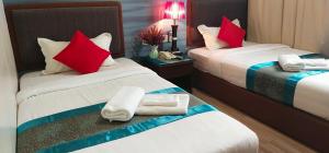 Postel nebo postele na pokoji v ubytování Comfort Hotel