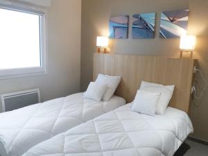 Fotografia z galérie ubytovania Superbe appartement pour 6 avec balcon, piscine chauffée et accès direct plage à La Tranche - FR-1-194-255 v destinácii La Tranche-sur-Mer
