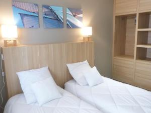 Fotografia z galérie ubytovania Superbe appartement pour 6 avec balcon, piscine chauffée et accès direct plage à La Tranche - FR-1-194-255 v destinácii La Tranche-sur-Mer