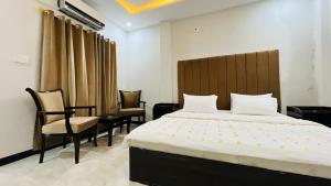 Giường trong phòng chung tại Hotel Double1