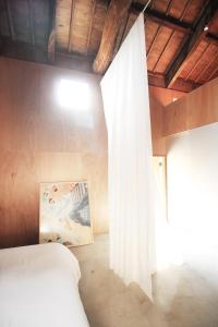 Ένα ή περισσότερα κρεβάτια σε δωμάτιο στο Akizuki Casa-Kura