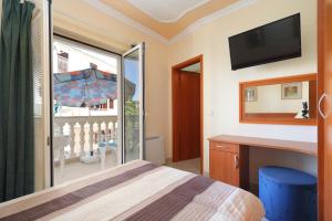 Posteľ alebo postele v izbe v ubytovaní Apartment Brodarica 15270a