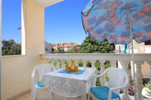 Balkón alebo terasa v ubytovaní Apartment Brodarica 15270a