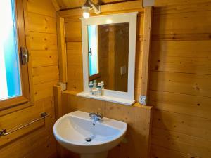 A bathroom at Agri Camp Dolomiti Még 37 kép