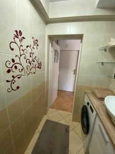 Ванная комната в Apartament Pomarańczowy - kawalerka w Śródmieściu