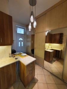 Kuchyň nebo kuchyňský kout v ubytování BöSIX Apartman