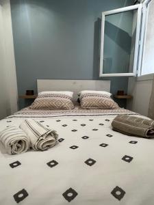 Cama ou camas em um quarto em T2 Cosy aux pieds de Notre Dame de la Garde