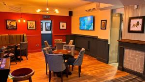 Televiisor ja/või meelelahutuskeskus majutusasutuses The Hoptimist