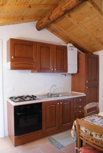 Kuchyň nebo kuchyňský kout v ubytování Antico Castello