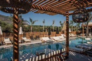 Bazén v ubytování Indigo Inn Casa Adults Only nebo v jeho okolí