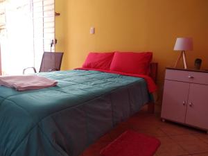 Postel nebo postele na pokoji v ubytování Habitación 2p independiente desde el jardin - Tierra del Sol Eterno - Ica Centro