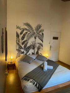 מיטה או מיטות בחדר ב-Les Baroudeurs Hostel