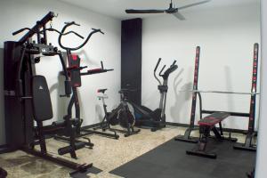 a gym with several exercise bikes and tread machines at Quart Youth Hostel & Apartments in Valencia