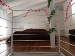 Postel nebo postele na pokoji v ubytování B&B Antico Castello