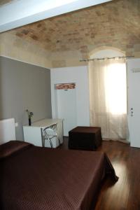 Postel nebo postele na pokoji v ubytování B&B Antico Castello