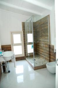 a bathroom with a shower and a sink at B&B Antico Castello in Altamura