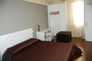 Postel nebo postele na pokoji v ubytování B&B Antico Castello