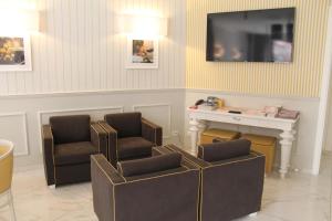 TV a/nebo společenská místnost v ubytování Hotel La Pace