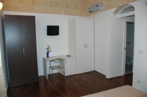 TV a/nebo společenská místnost v ubytování B&B Antico Castello + 20 fotografií