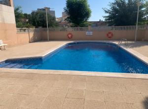Bazén v ubytovaní Casa de playa alebo v jeho blízkosti