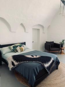 Tempat tidur dalam kamar di Villetta San Bartolomeo