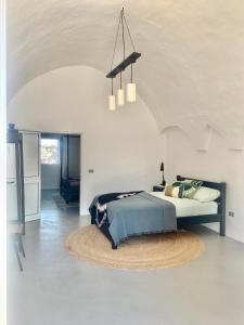 Tempat tidur dalam kamar di Villetta San Bartolomeo