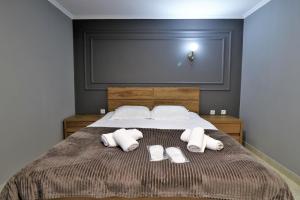 Кровать или кровати в номере Hotel Rose