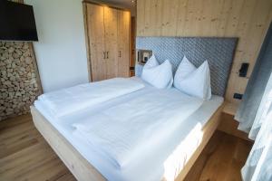 Postel nebo postele na pokoji v ubytování Chalet am Wiesenweg