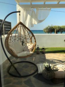 A balcony or terrace at Longbeachvillas 2 Thesia beachfront villa