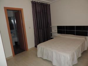 Posteľ alebo postele v izbe v ubytovaní Apartamento Molino VII