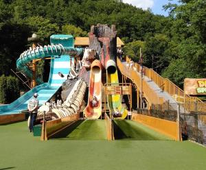 a large water slide in a water park at Happy Duplex in Jalhay