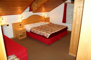 Säng eller sängar i ett rum på Albergo Trentino