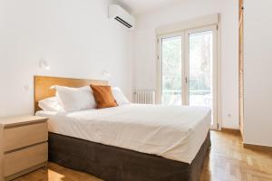 Posteľ alebo postele v izbe v ubytovaní Neat Kolonaki Apartment, Athens City Centre - NV8