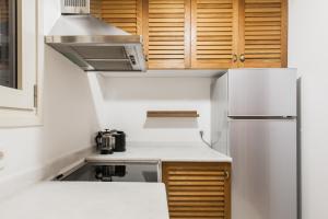 Kuchyňa alebo kuchynka v ubytovaní Neat Kolonaki Apartment, Athens City Centre - NV8