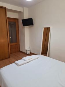 Postel nebo postele na pokoji v ubytování Habitación con baño privado- En casa familiar Beatriz