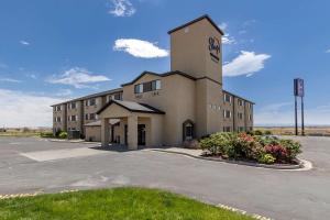 an empty parking lot in front of a building at Sleep Inn & Suites Jerome - Twin Falls in Jerome