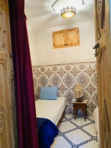 Ένα ή περισσότερα κρεβάτια σε δωμάτιο στο Maison 211