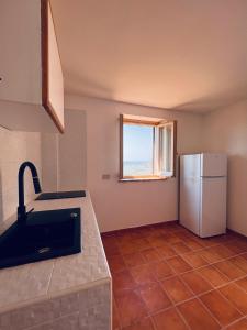 A kitchen or kitchenette at La bella vista