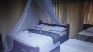 Voodi või voodid majutusasutuse fullesguesthouse toas