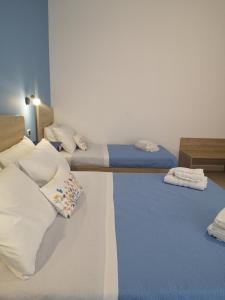 Postel nebo postele na pokoji v ubytování Villa Gaia