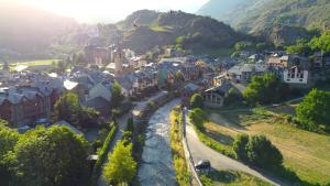 an aerial view of a small town in the mountains at Modern apartament de muntanya amb llar de foc by RURAL D'ÀNEU in Esterri d'Àneu