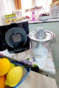 A kitchen or kitchenette at Butterfly Appartamento